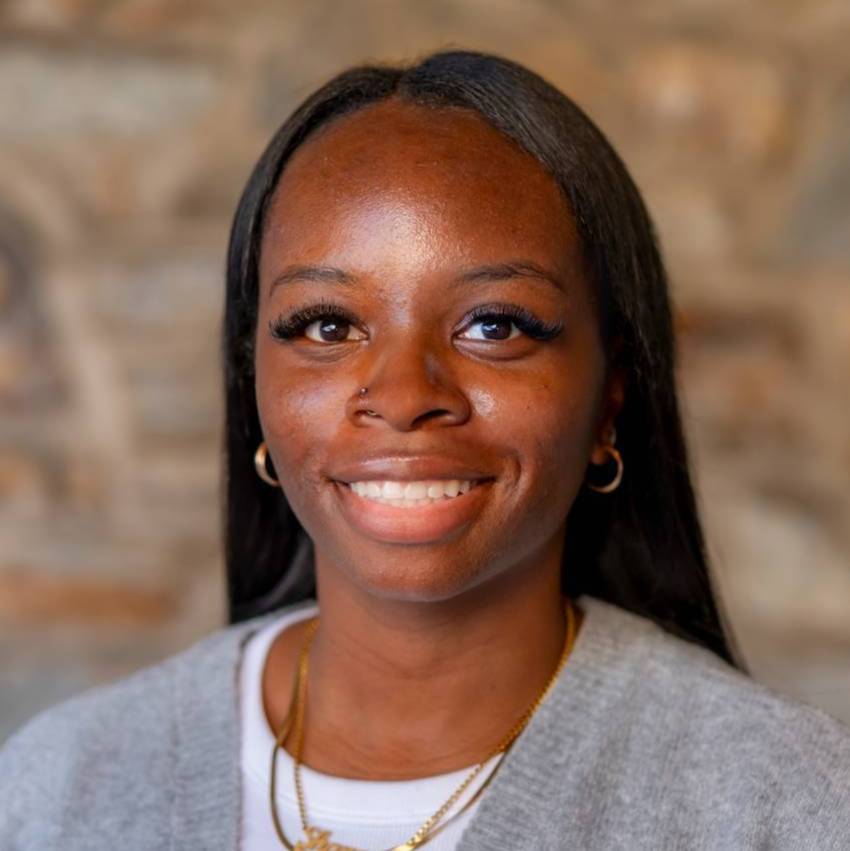 Staff member smiling 